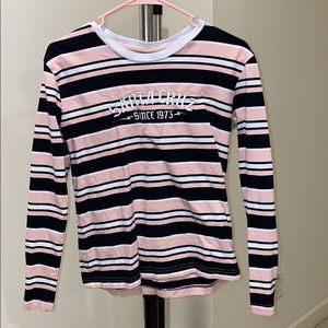 pink black and white stripped top